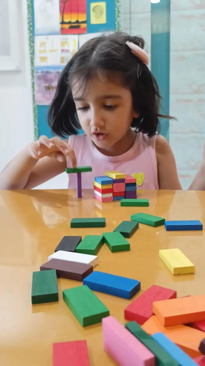 Child engaging in educational play