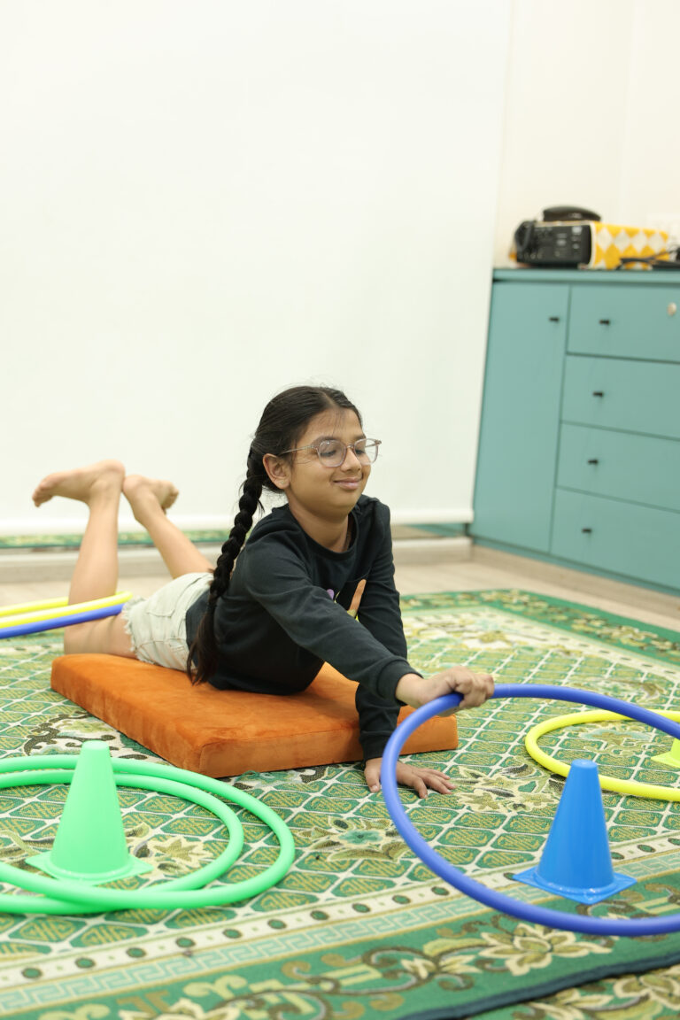 Young girl engaged in physical activity session at the special education center at Zack