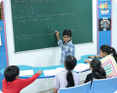 Children learning number skills at Zack's tuition classes in Surat